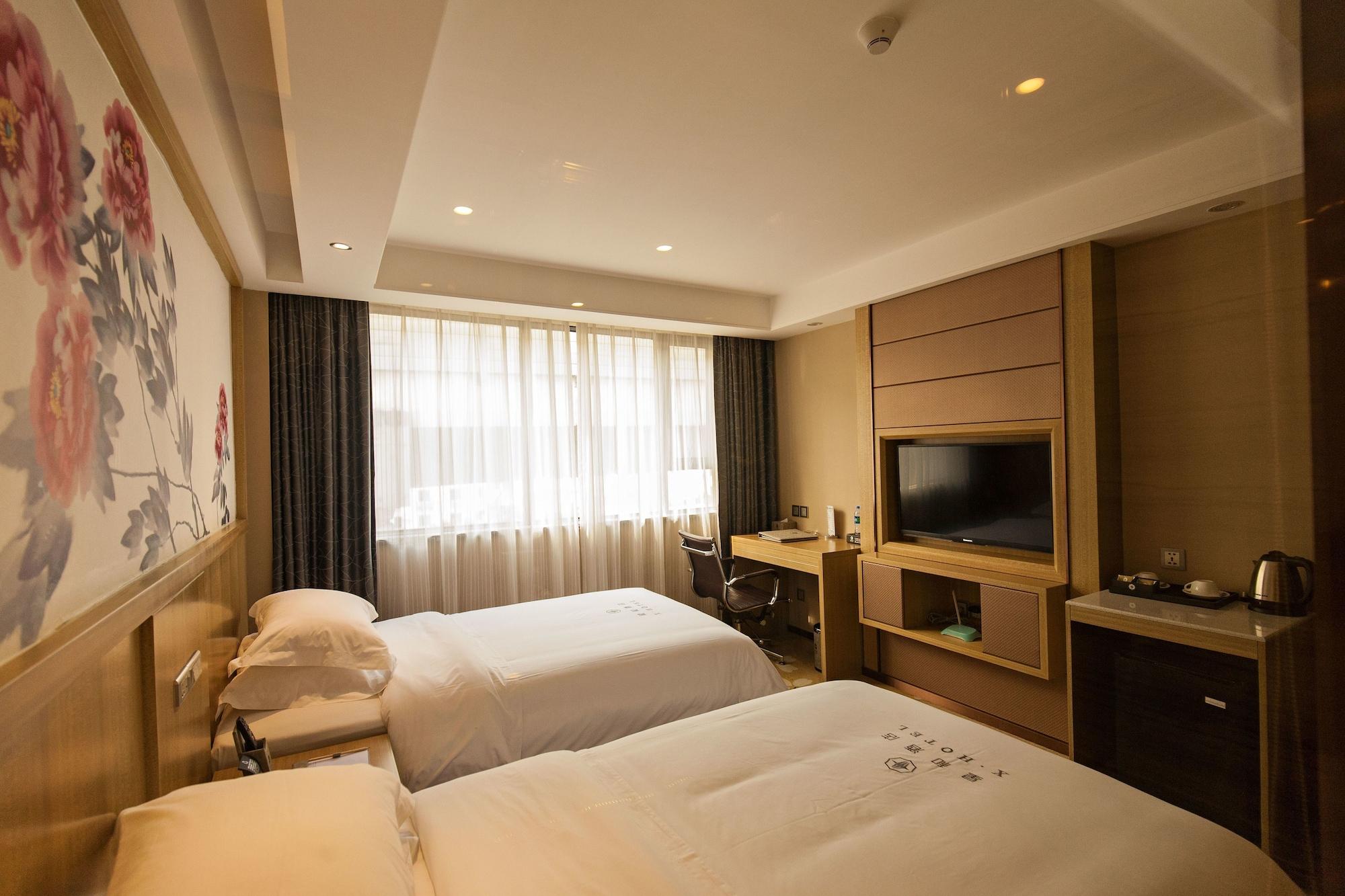 Xinghe Hotel Guagnzhou East Railway Station Branch Гуанчжоу Экстерьер фото